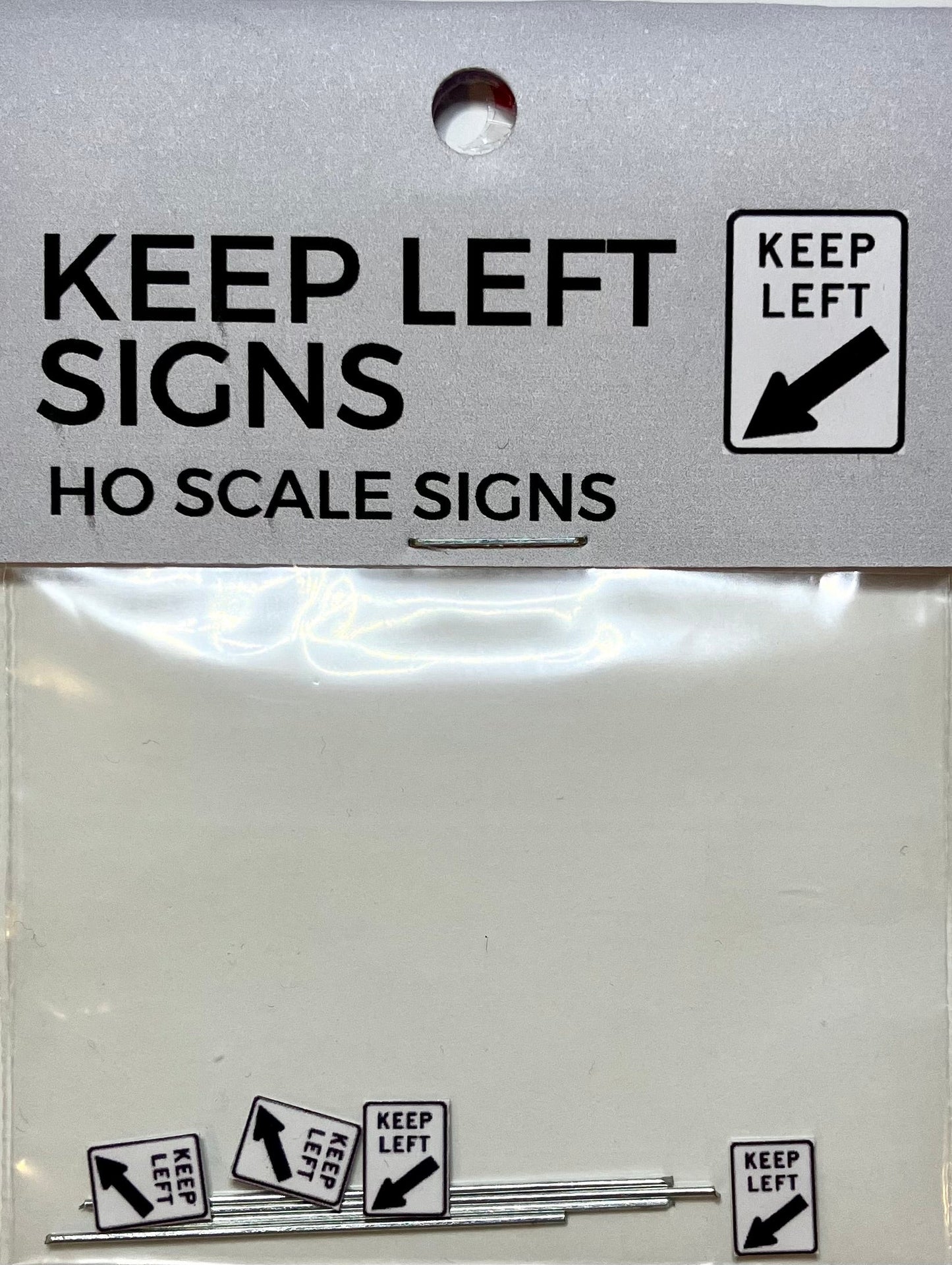 Train Girl Keep Left Signs 4 Pack (HO)